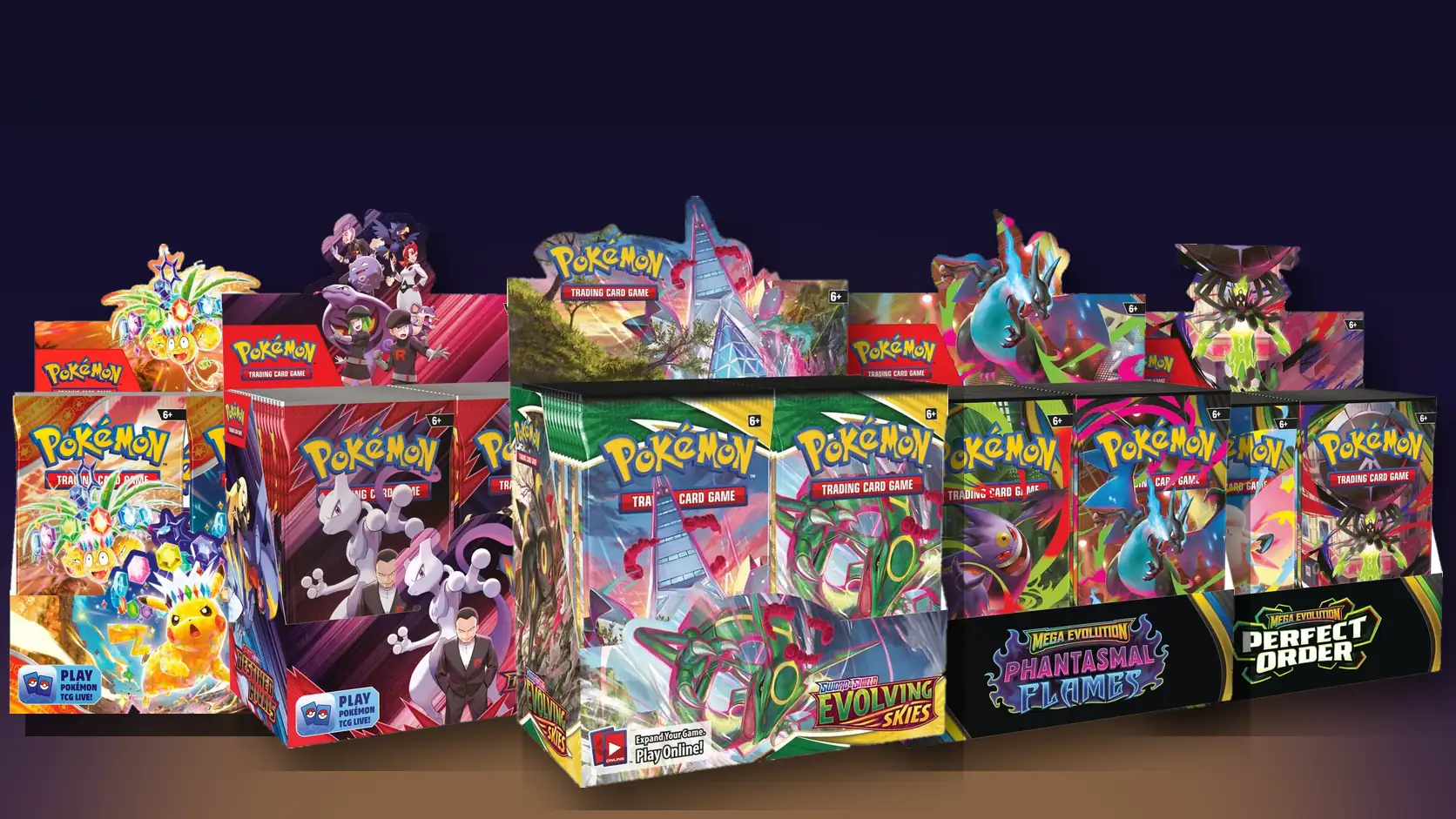 Five Pokémon booster boxes: Evolving Skies in front, with Surging Sparks, Destined Rivals, Phantasmal Flames and Perfect Order behind it